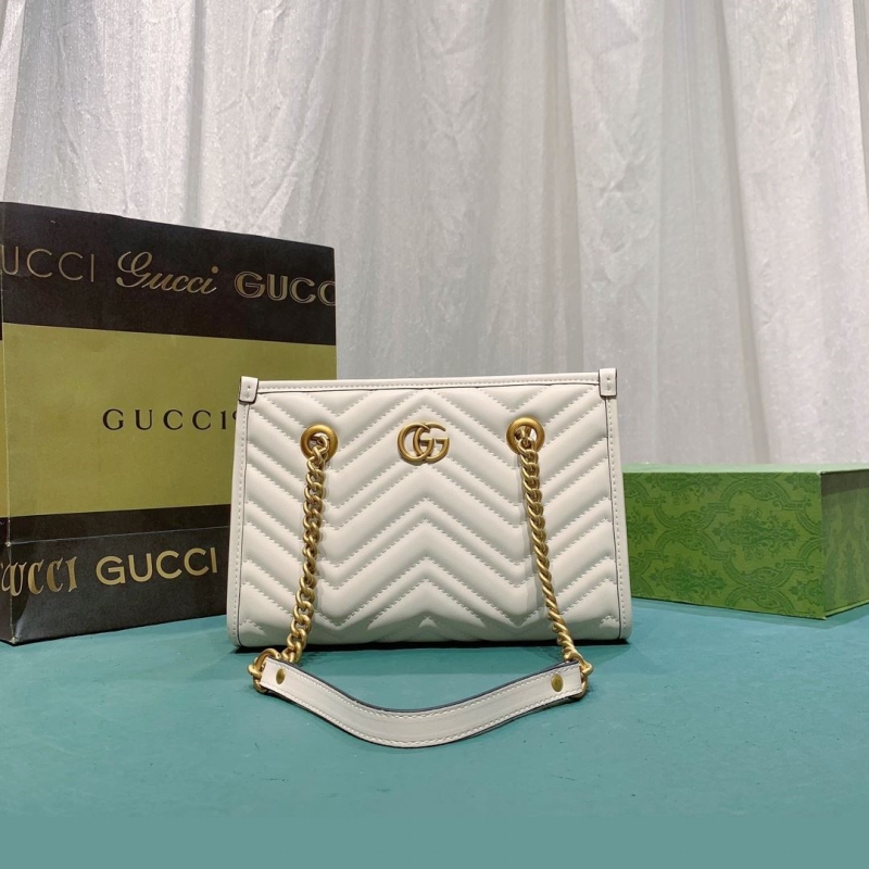G*u*i shopping bags